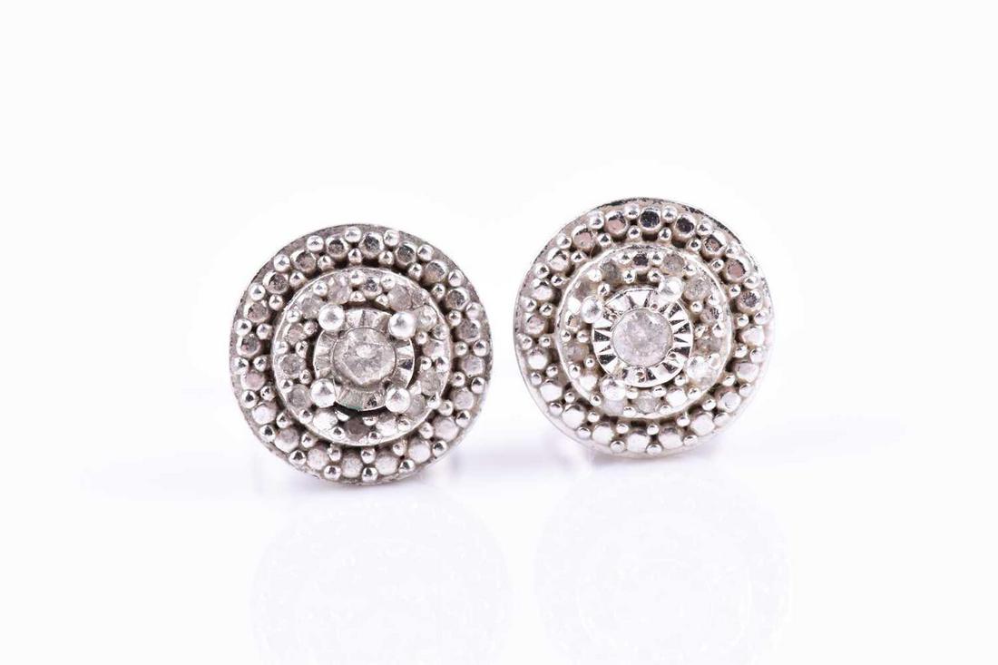 A pair of white metal and diamond cluster ear studs,7 (1 of 2)