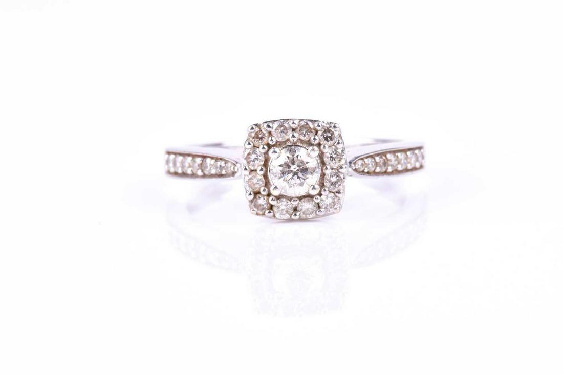 A diamond cluster ring, the cushion shaped cluster set (1 of 5)