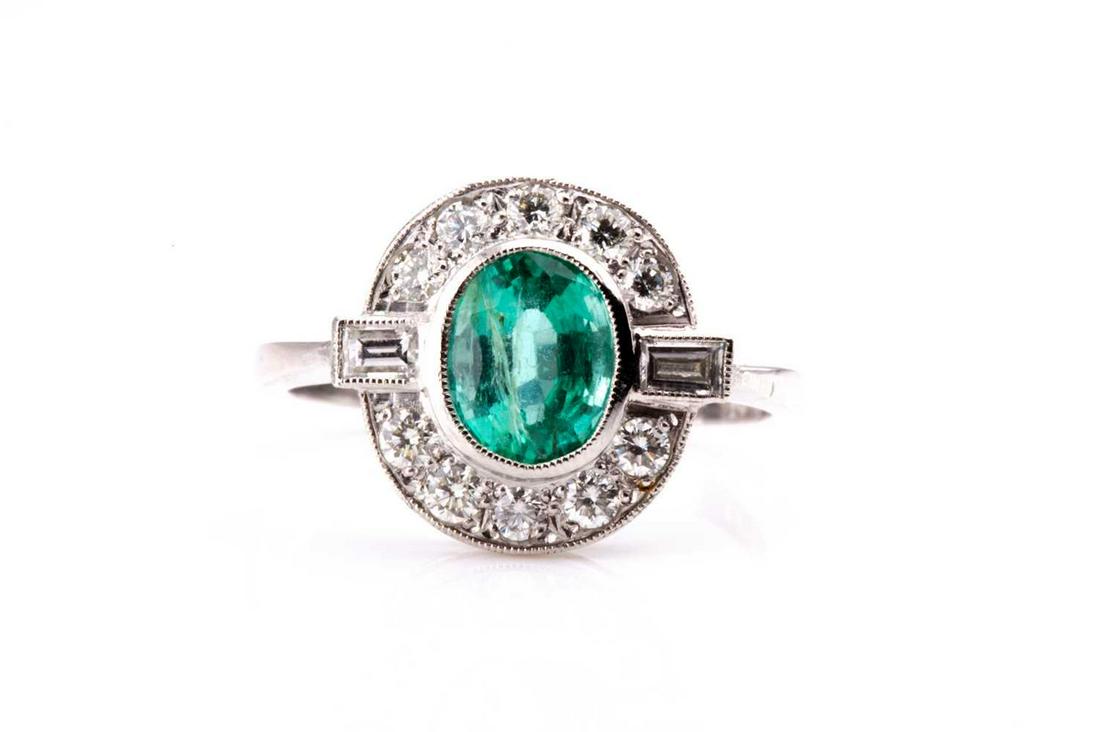 A platinum, diamond, and emerald ring, set with a mixed (1 of 3)