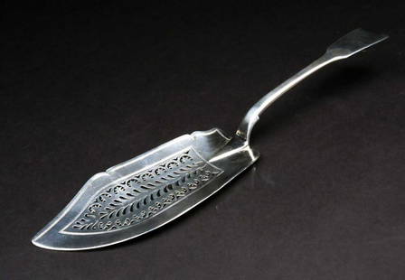 A George IV silver fish slice, London 1828 by William: A George IV silver fish slice, London 1828 by William Traies, with pierced decoration, 29 cm, 4 ozt.