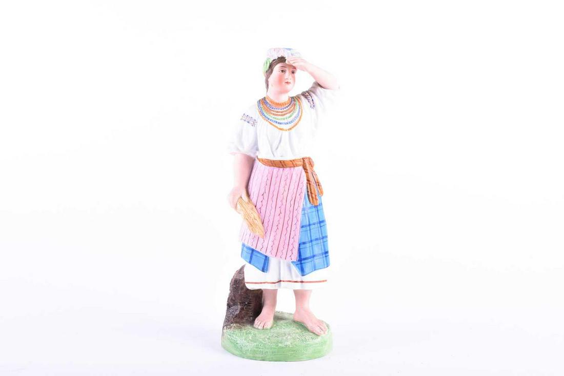 A 19th century Russian Gardner Porcelain figure,: A 19th century Russian Gardner Porcelain figure, 'Ukranian Peasant Girl', decorated in polychrome enamels on an integral circular base, impressed and printed marks, 21.5 cm high. Footnote: Provenance: