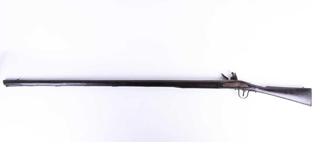 An Indian flintlock long rifle, late 18th /early 19th: An Indian flintlock long rifle, late 18th /early 19th century, the barrel 129.5cm, 171cm overall