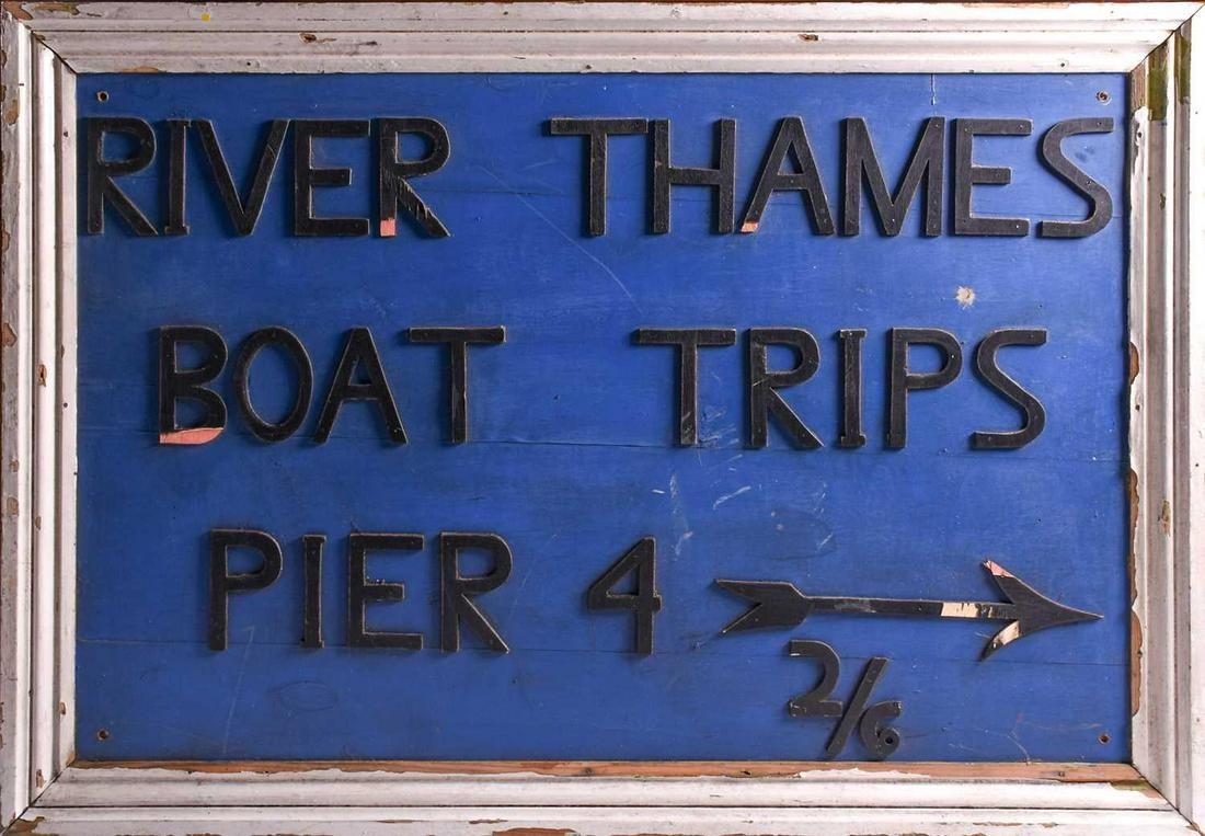 A early to mid 20th century large wooden directional: A early to mid 20th century large wooden directional sign, 'River Thames Boat Trips Pier 4, with applied black-painted letters on a blue ground, within a white painted border, 89 cm x 129 cm.