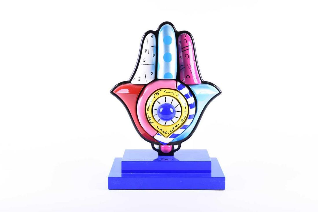 Romero Britto (b.1963) Brazilian, an abstract: Romero Britto (b.1963) Brazilian, an abstract three-dimensional sculpture modelled as an eye, mixed material, signed to the blue, stepped plinth, 34 cm high.