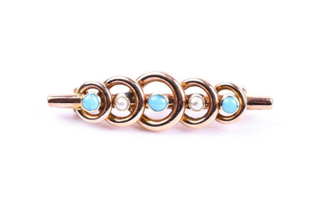An early 20th century yellow metal, turquoise, and: An early 20th century yellow metal, turquoise, and pearl bar brooch, the stones set in circular mounts, 4 cm long, 3.8 grams.