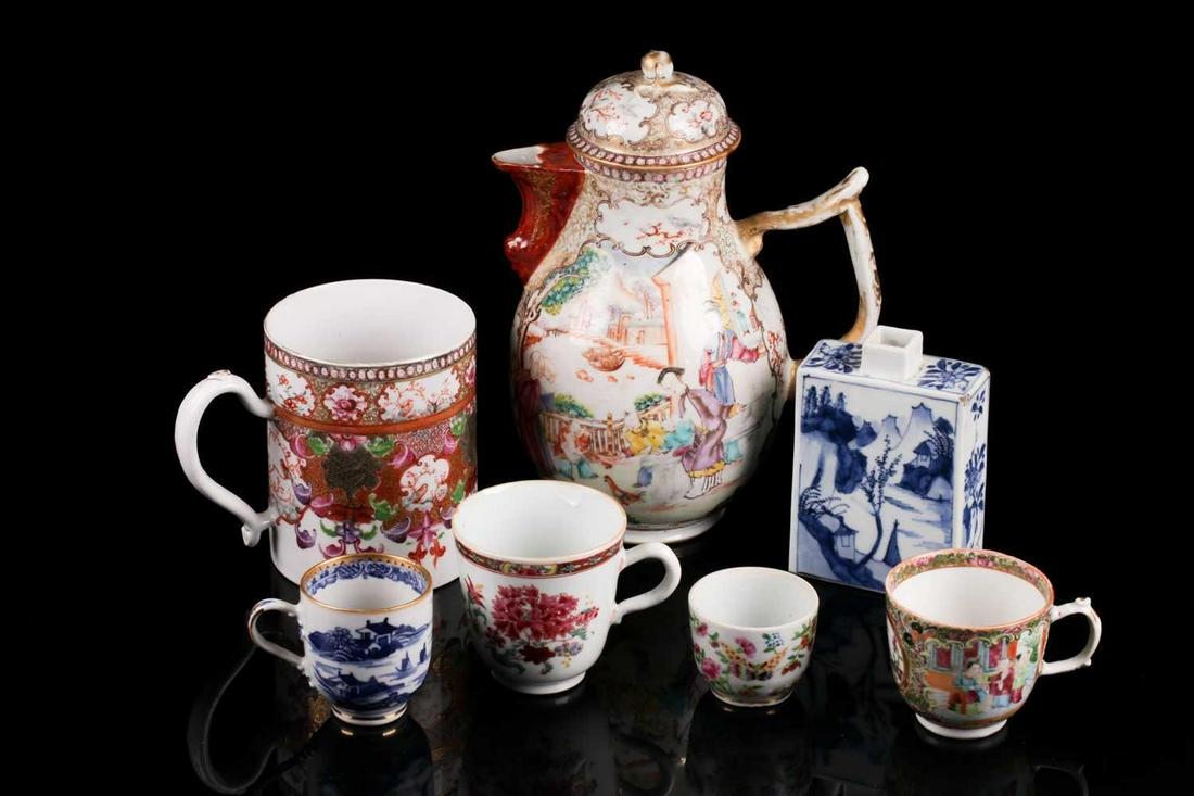 A Chinese Qianlong, famile rose porcelain cylindrical: A Chinese Qianlong, famile rose porcelain cylindrical porter mug with vignettes of roosting finches amongst diaper and karakusa borders and paulownia leaves. Fitted with a molded loop handle with ruyi