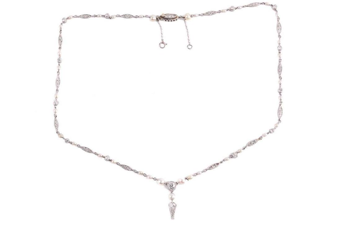 An Art Deco chain necklace set with pearls and old-cut diamonds, composed of diamond-set: An Art Deco chain necklace set with pearls and old-cut diamonds, composed of diamond-set navette-shaped links with millgrain details, flanked by small pearls and engraved spacers collet-set with old-c