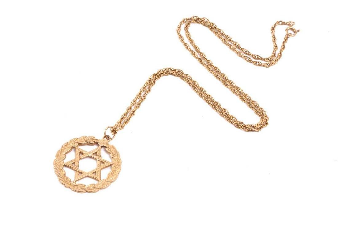 A 9ct gold Star of David pendant on chain, depicting a beaded Star of David framed by a laurel: A 9ct gold Star of David pendant on chain, depicting a beaded Star of David framed by a laurel wreath, suspending on a loose rope chain with spring-ring clasp, pendant with London assay marks '375', d