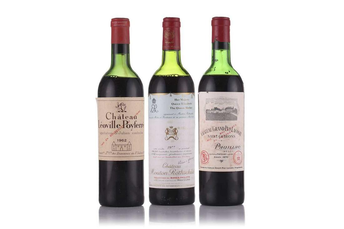 A bottle of Chateau Grand Puy Lacoste Saint Guirons Pauillac 1970, together with a Chateau Mouton: A bottle of Chateau Grand Puy Lacoste Saint Guirons Pauillac 1970, together with a Chateau Mouton Rothschild 'Her Majesty Queen Elizabeth The Queen Mother Pauillac 1977', and a bottle of Chateau Leovi