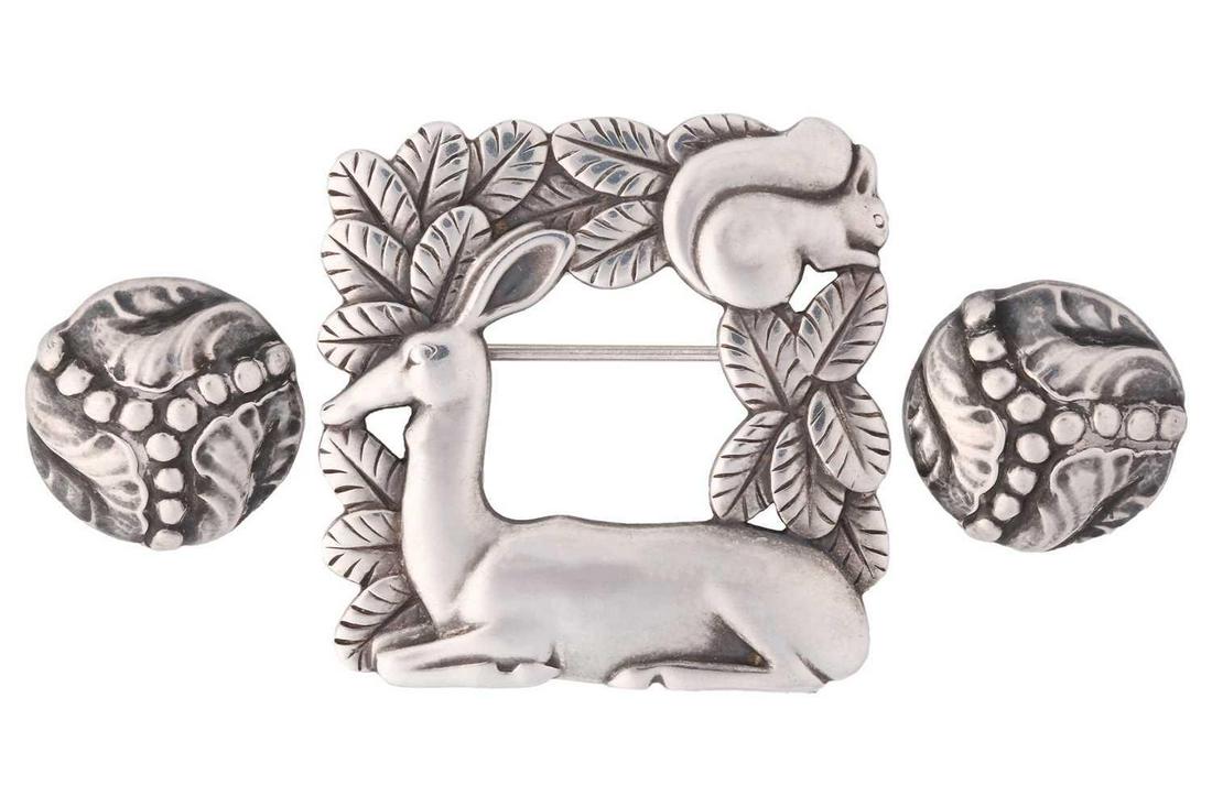 Georg Jensen - a square openwork brooch and a pair of stylised foliate buttons; the brooch features (1 of 4)