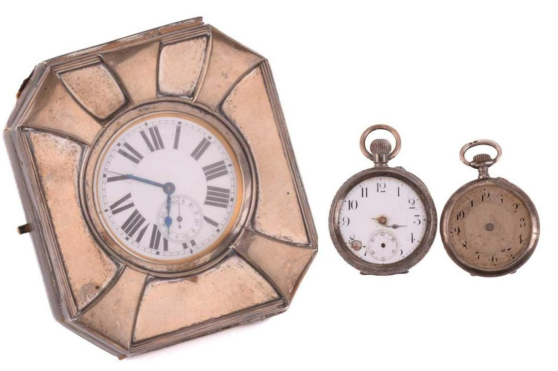 A Goliath pocket watch in a silver case and two further silver pocket watches. The Goliath pocket (1 of 11)