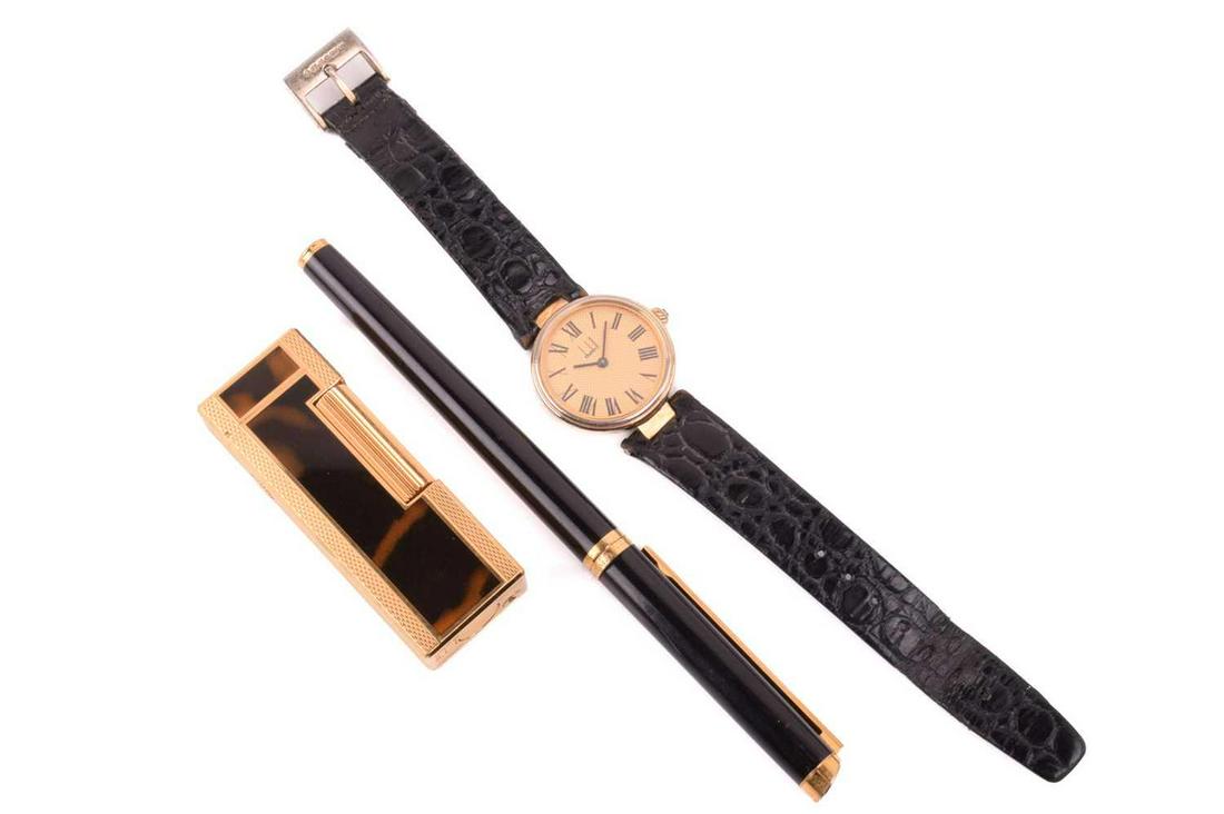 Dunhill - collectors' lot comprising a lighter, a fountain pen and a watch; the Rollagas lighter (1 of 20)