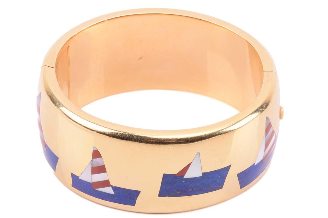 Tiffany & Co. - a 'Sailboats' hinged bangle designed by Angela Cummings, inlaid with lapis lazuli, (1 of 6)