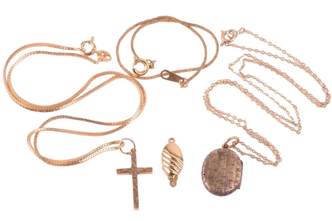 A gold cross with hallmarks for 9ct gold, with a foxtail chain marked 750 measuring 40.5cm in (1 of 9)