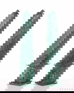 A pair of large and impressive malachite obelisks, 20th century with panelled and moulded plinths.: A pair of large and impressive malachite obelisks, 20th century with panelled and moulded plinths. 51 cm high Private estate