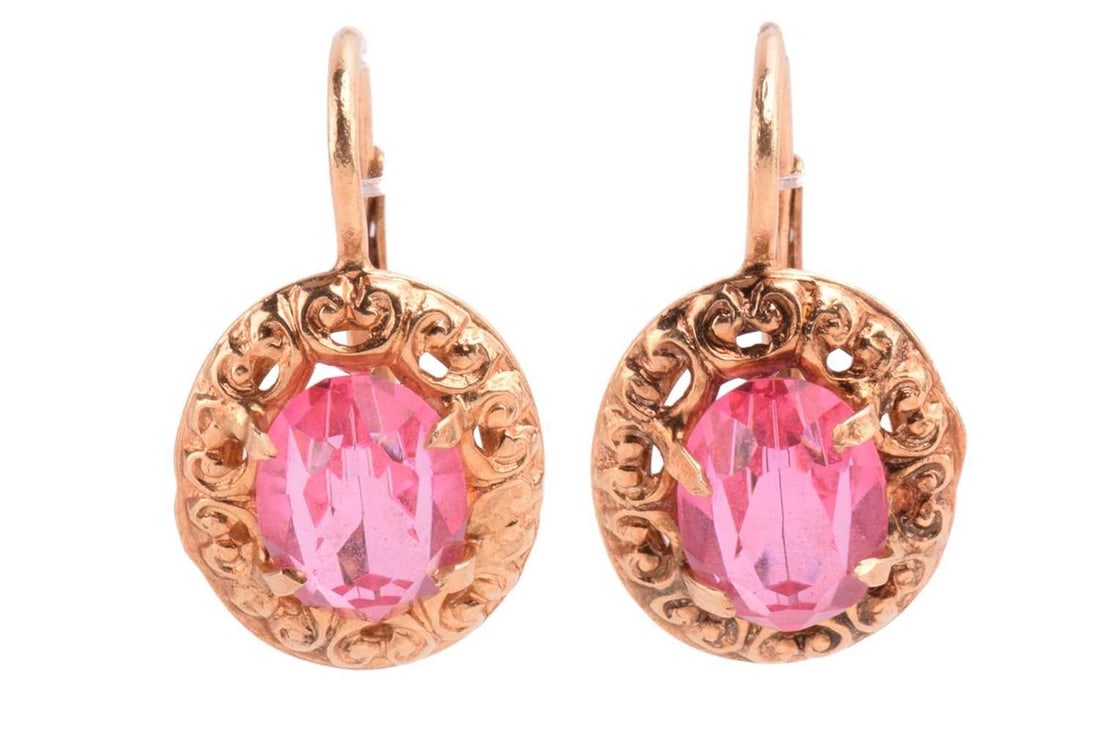 A pair of Italian single-stone pink paste earrings; the oval cut pastes in claw mounts within a (1 of 3)