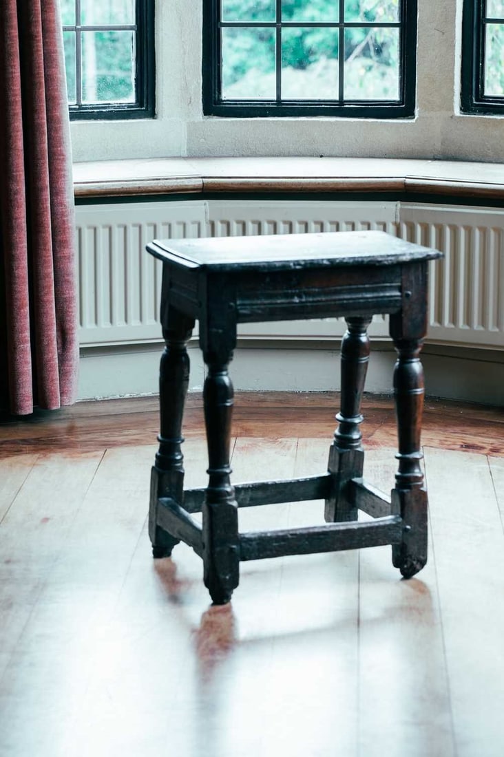 A 17th century oak joint stool, with moulded top over slender cup and cover supports, 53 cm high x (1 of 1)