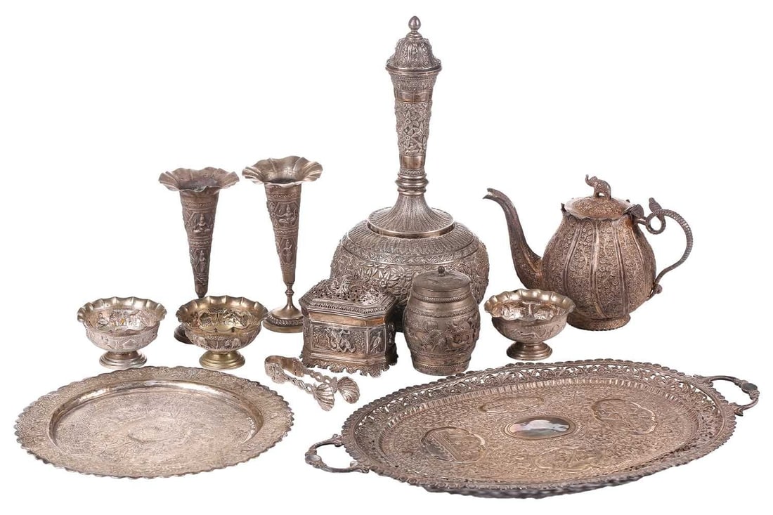 A Burmese silver canted rectangular betel box and cover, C1900 with domed cover embossed in high (1 of 8)