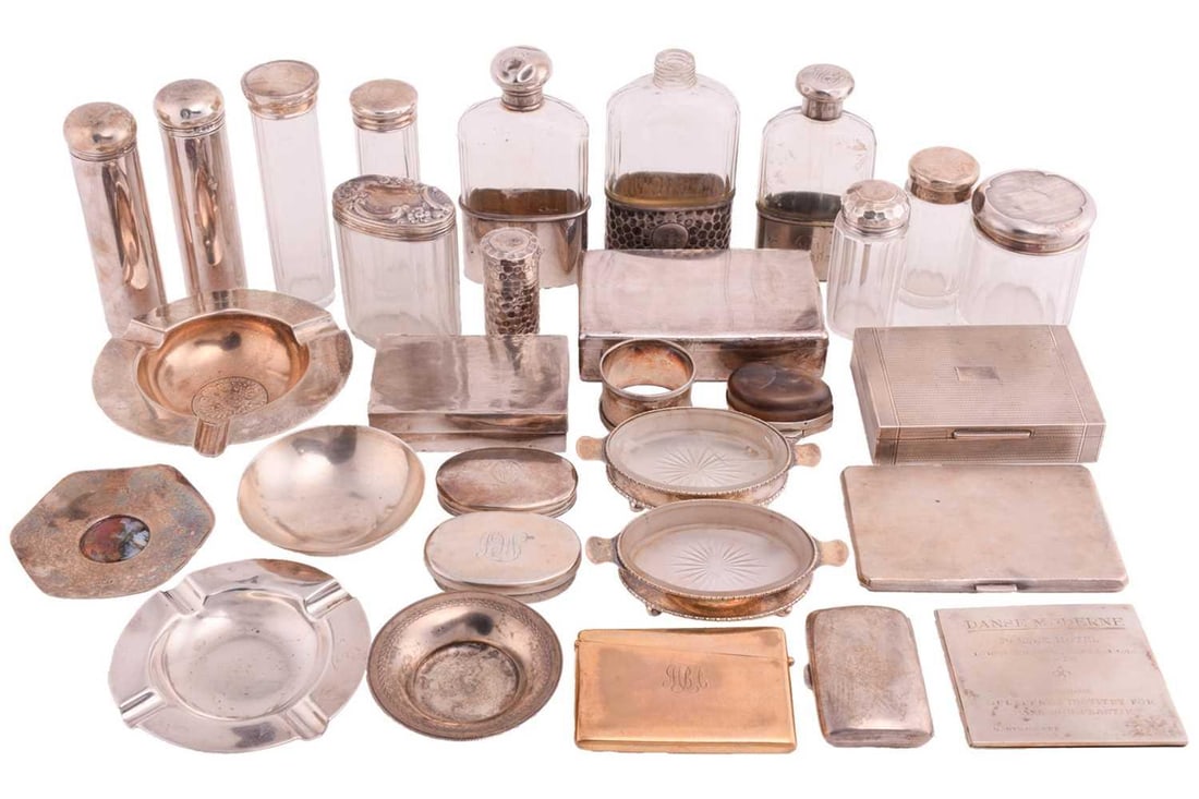 A collection of silver and silver plate items including three hip flasks, one lacking cover, two: A collection of silver and silver plate items including three hip flasks, one lacking cover, two silver ashtrays, two silver cigarette cases, a cigarette box with engine turned decoration, stamped sil