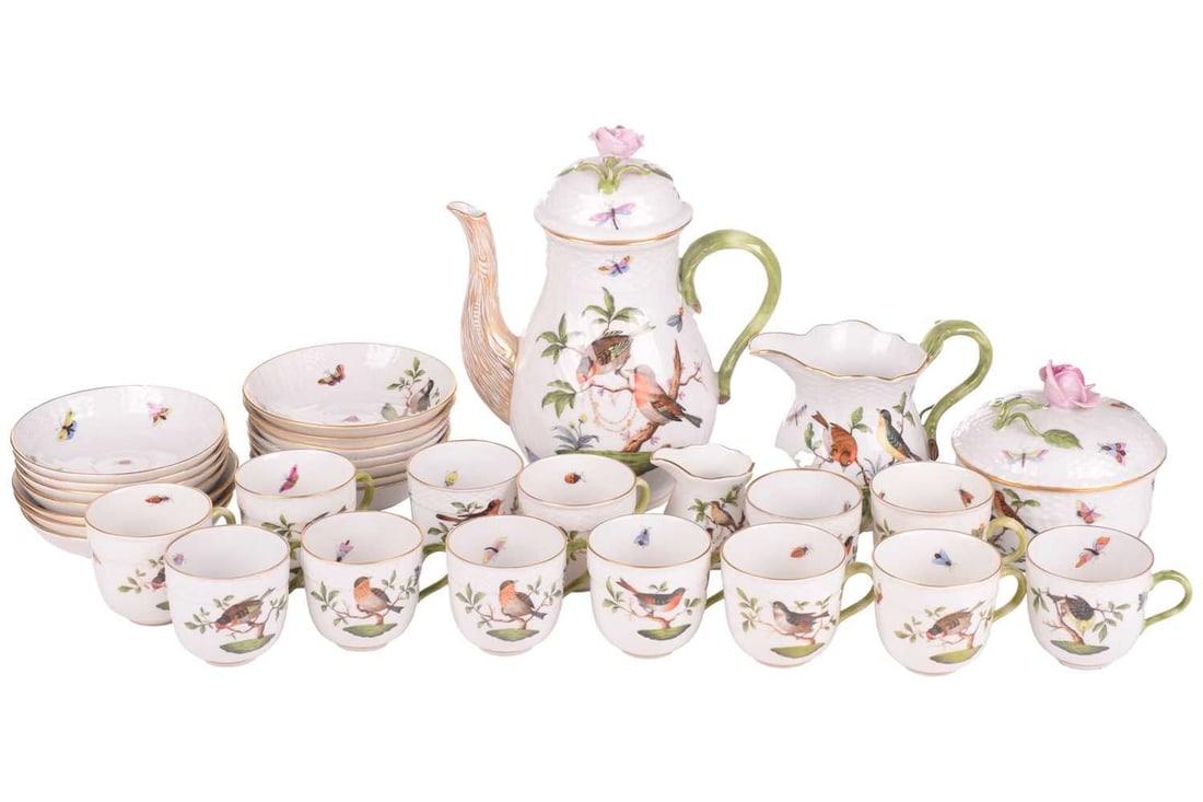 A Herend Rothschild Botanical Bird porcelain tea set, comprising thirteen cups, fourteen saucers, a: A Herend Rothschild Botanical Bird porcelain tea set, comprising thirteen cups, fourteen saucers, a teapot, a milk and a cream jug and a sugar bowl and cover