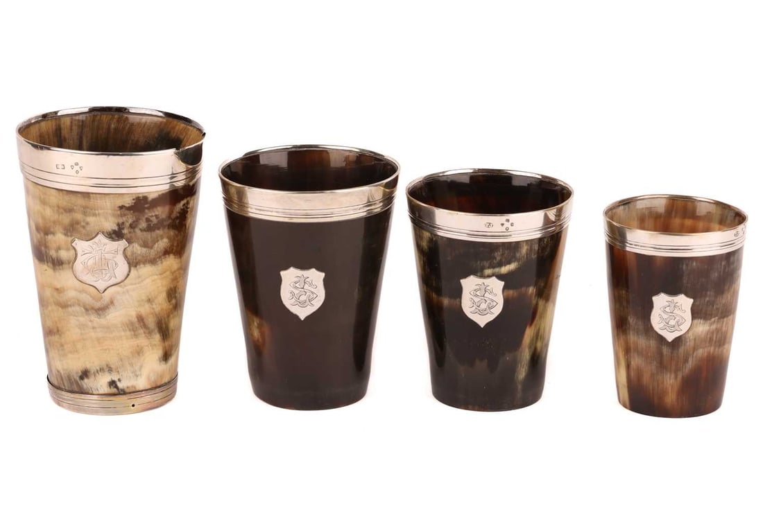 A collection of sterling silver mounted horn beakers, of graduated size, largest 12.5 cm tallDamage (1 of 5)