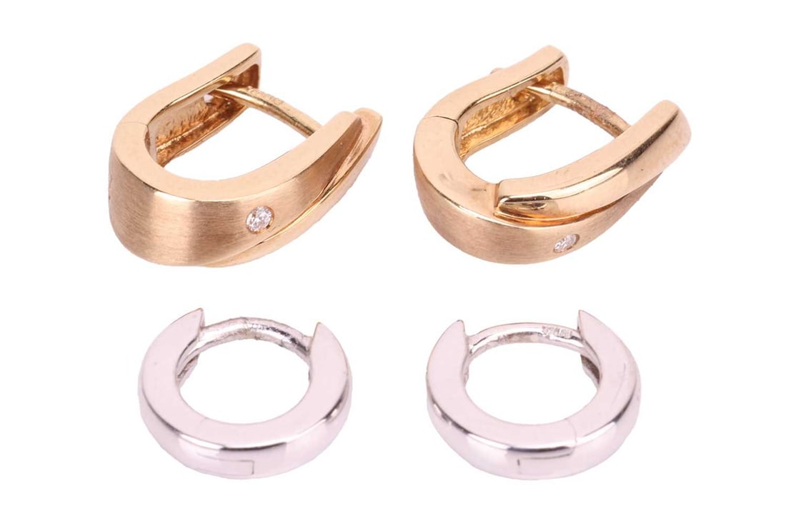 A pair of huggy earrings in 9ct white gold, and a pair of diamond-set hoop earrings in 18ct yellow g (1 of 2)
