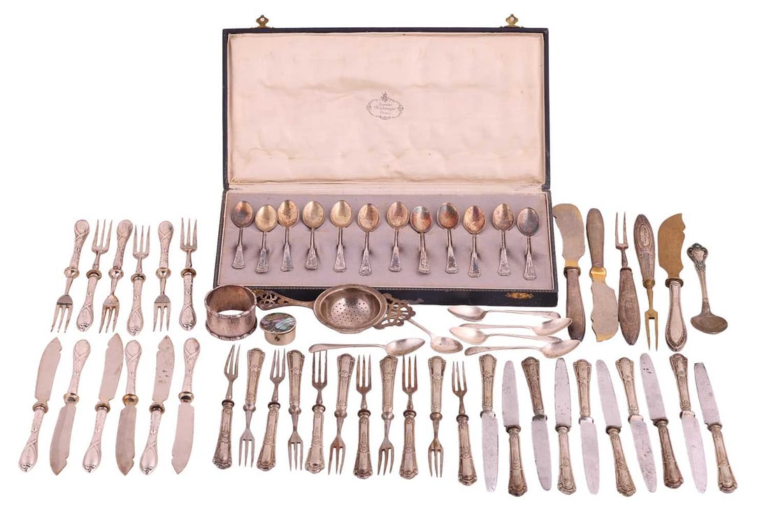 A cased set of German silver spoons, together with a large quantity of silver flatware, a napkin rin: A cased set of German silver spoons, together with a large quantity of silver flatware, a napkin ring, a tea strainer and a pill box. 5.35 ozt weighable