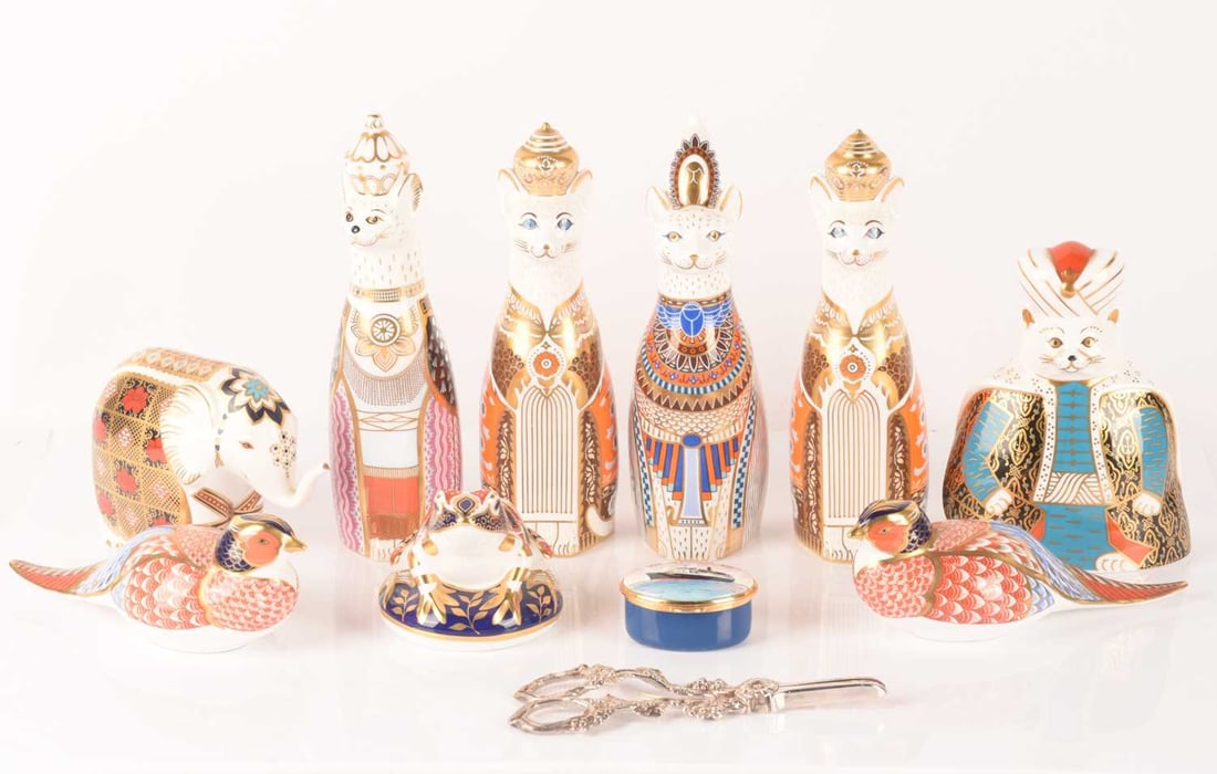 A collection of Royal Crown Derby Royal Cats comprising a pair of Siamese, a Burmese, a Persian, and (1 of 14)