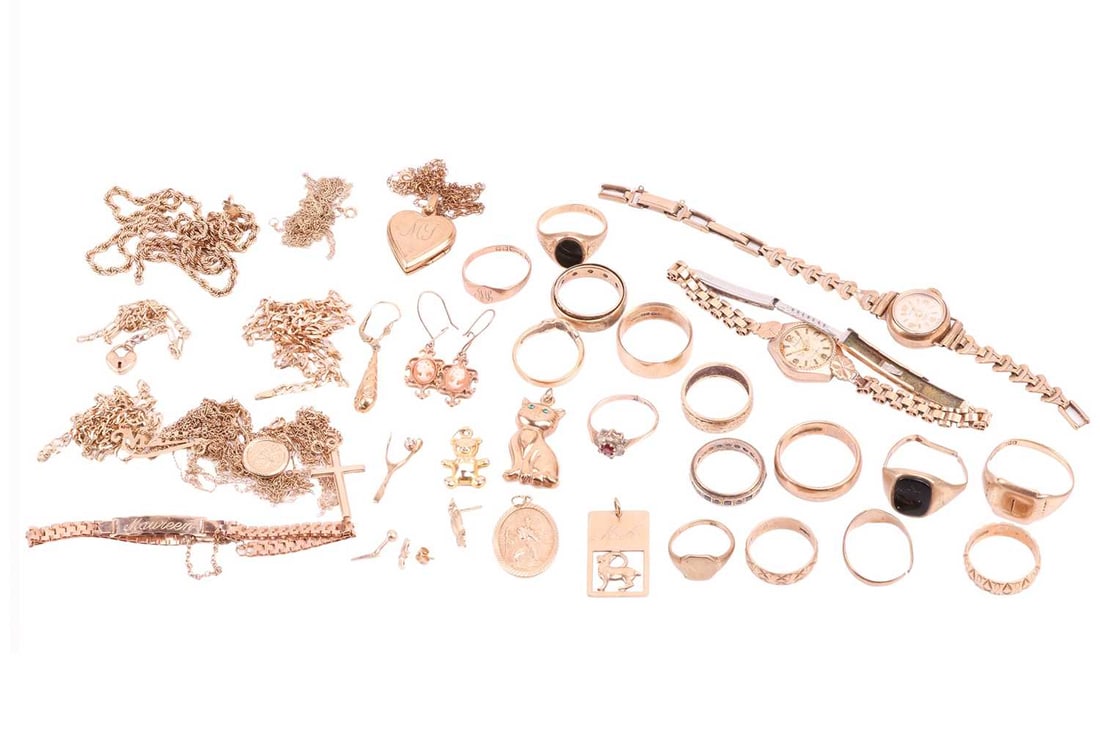 A large collection of jewellery items including sixteen 9ct yellow gold rings, two ladies wristwatch (1 of 7)