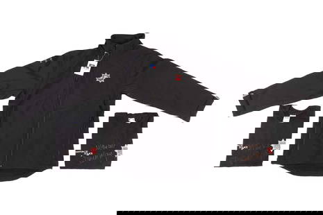 James Bond: a crew-issued jacket for 'Spectre', with the film logo and 'Fire Crew 2015' to the sleev: James Bond: a crew-issued jacket for 'Spectre', with the film logo and 'Fire Crew 2015' to the sleeve and 'DDA' badge to the chest, together with two Daniel Craig 'Quantum of Solace' signed T-shirts.
