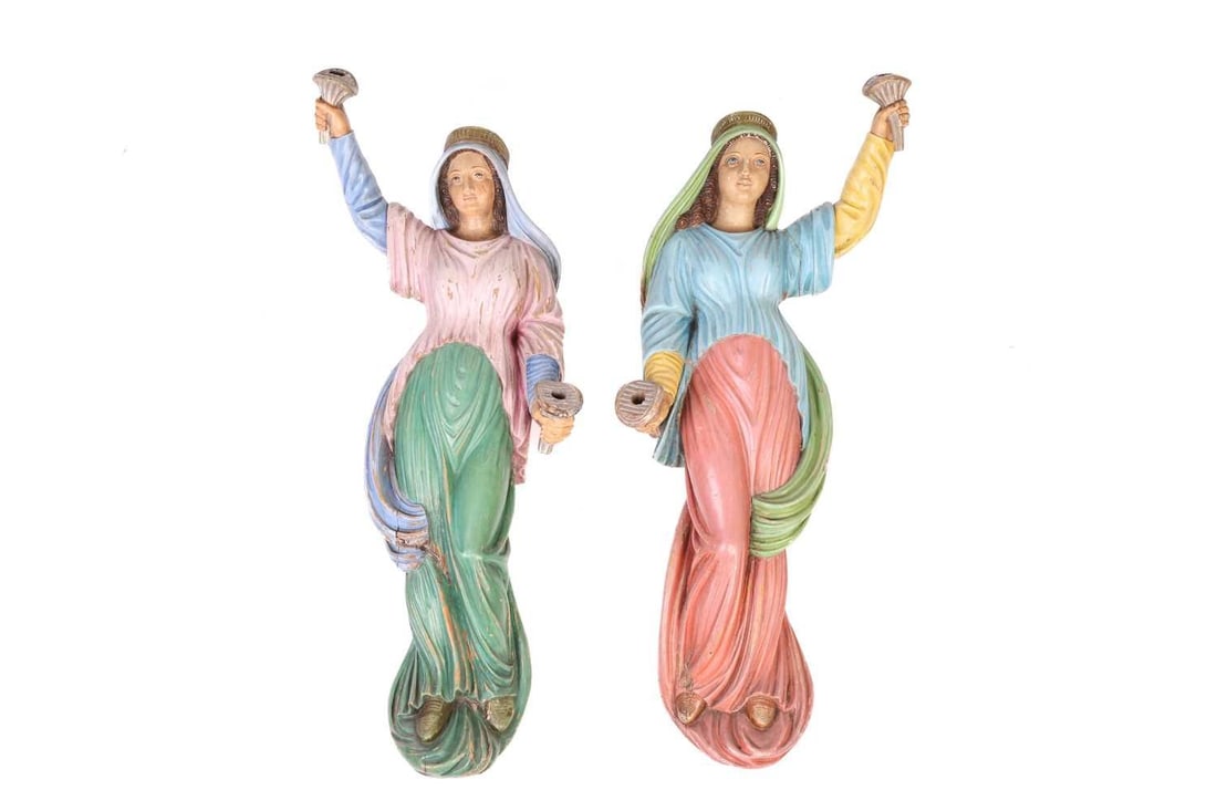 A pair of 19th-century European carved and painted wood figures of scroll bearers in Biblical: A pair of 19th-century European carved and painted wood figures of scroll bearers in Biblical attire, possibly from a large fairground organ, painted in colours with large fixing eyelets to the rear.