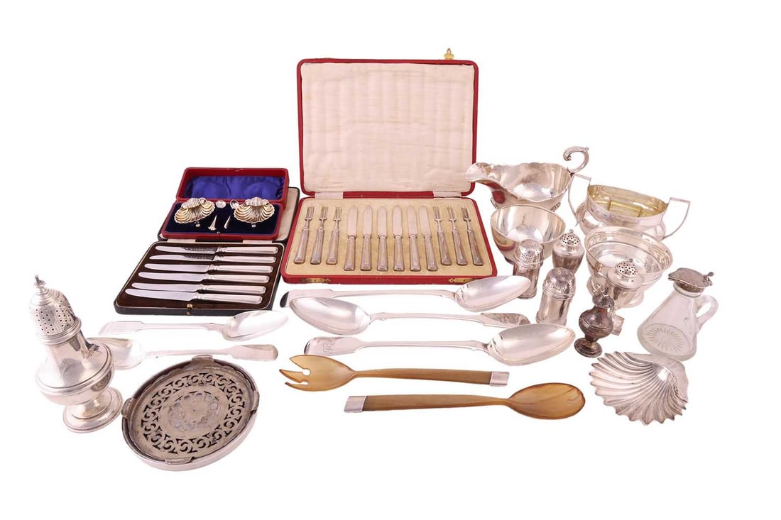 A collection of silver; including a silver sauce boat, Sheffield 1912; a two handled silver sugar bo: A collection of silver; including a silver sauce boat, Sheffield 1912; a two handled silver sugar bowl, London 1813; a cased set of silver fruit eaters; two further silver sugar bowls, a silver servin
