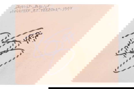 David Bowie: a loose signed page from an autograph book, dated 1997, a note from the previous owner: David Bowie: a loose signed page from an autograph book, dated 1997, a note from the previous owner indicating it was collected in Münster (Germany), on 22 February 1997. Bowie appeared on a live
