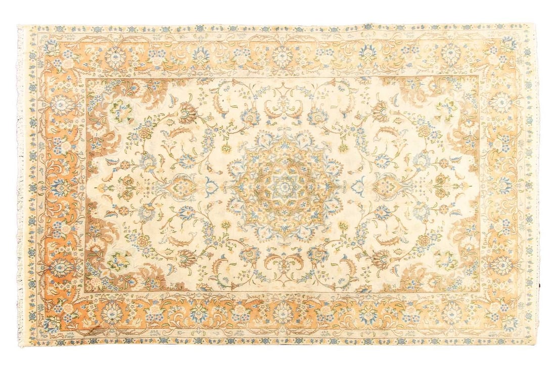 An ivory/ pistachio green ground part silk Tabriz carpet, 20th century, with a central dome and: An ivory/ pistachio green ground part silk Tabriz carpet, 20th century, with a central dome and hanging lanterns within a salmon-coloured palmette border, 302 cm x 189 cm