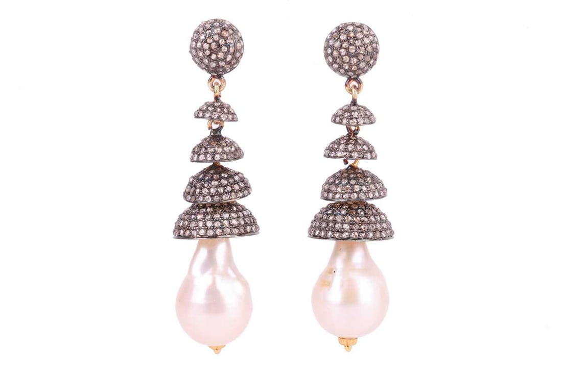 A pair of pearl drop chandelier earrings, each suspending a teardrop-shaped baroque pearl, from: A pair of pearl drop chandelier earrings, each suspending a teardrop-shaped baroque pearl, from tiers of graduated domes encrusted with rose-cut diamonds, to a conforming surmount fitted with post and