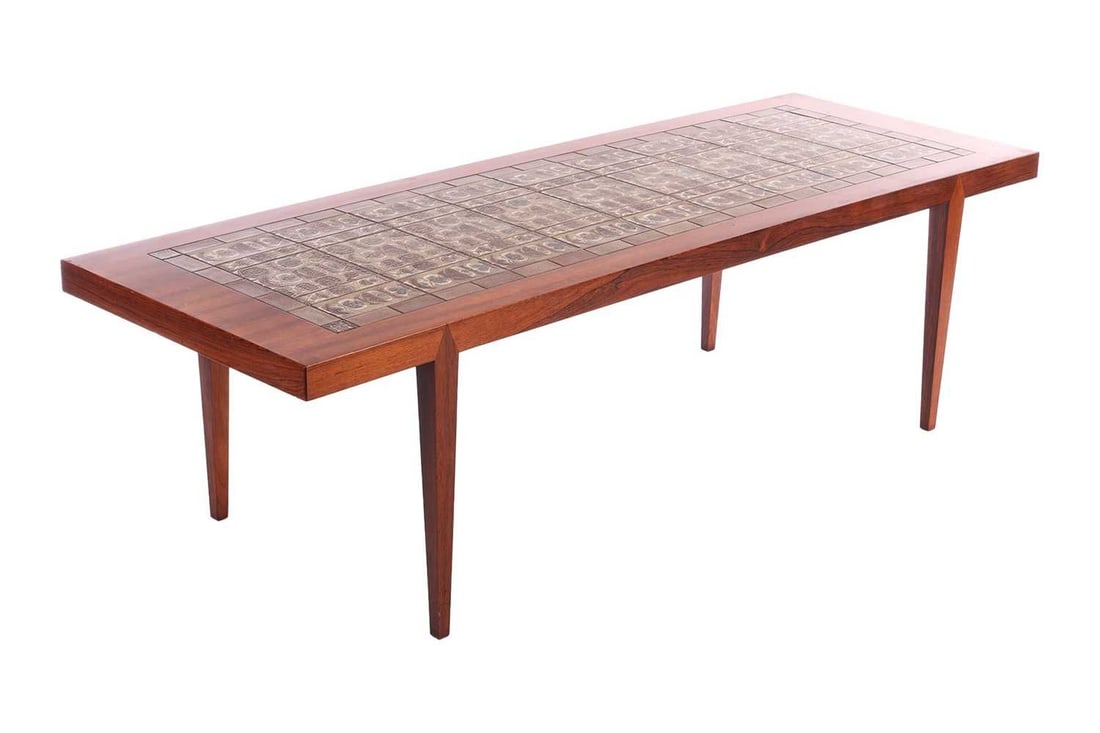 A 1960s rosewood Severin Hansen coffee table, with rectangular tiled top on square tapering legs,: A 1960s rosewood Severin Hansen coffee table, with rectangular tiled top on square tapering legs, stamped under the top and with Danish Furniture Makers Control label, 170 cm wide, 60 cm deep, 50 cm h
