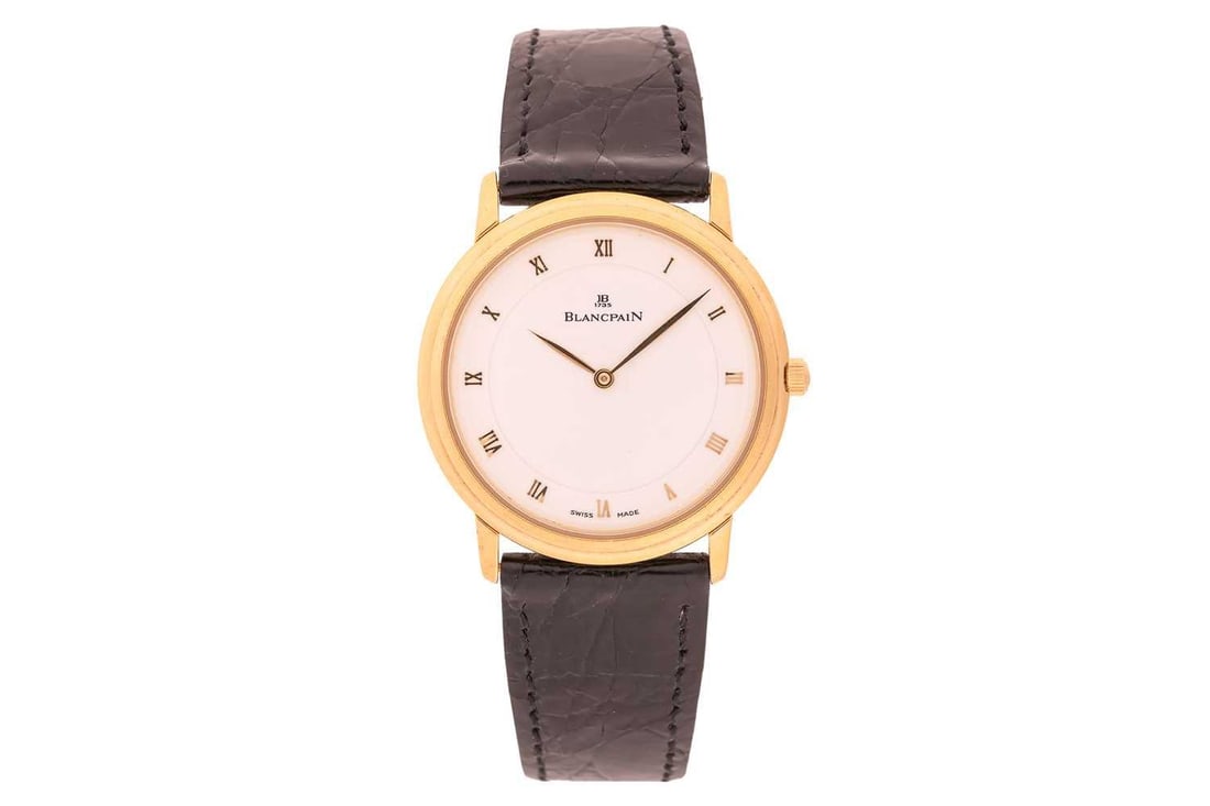 Blancpain An 18 Carat Gentleman's Dress Watch Edition: No. 118 Case Material: 18 Carat Yellow Gold,: Blancpain An 18 Carat Gentleman's Dress Watch Edition: No. 118 Case Material: 18 Carat Yellow Gold, Skeletonised Caseback Case Diameter: 35mm Dial: White Numerals: Roman Movement: Mechanical Cal. 21 S