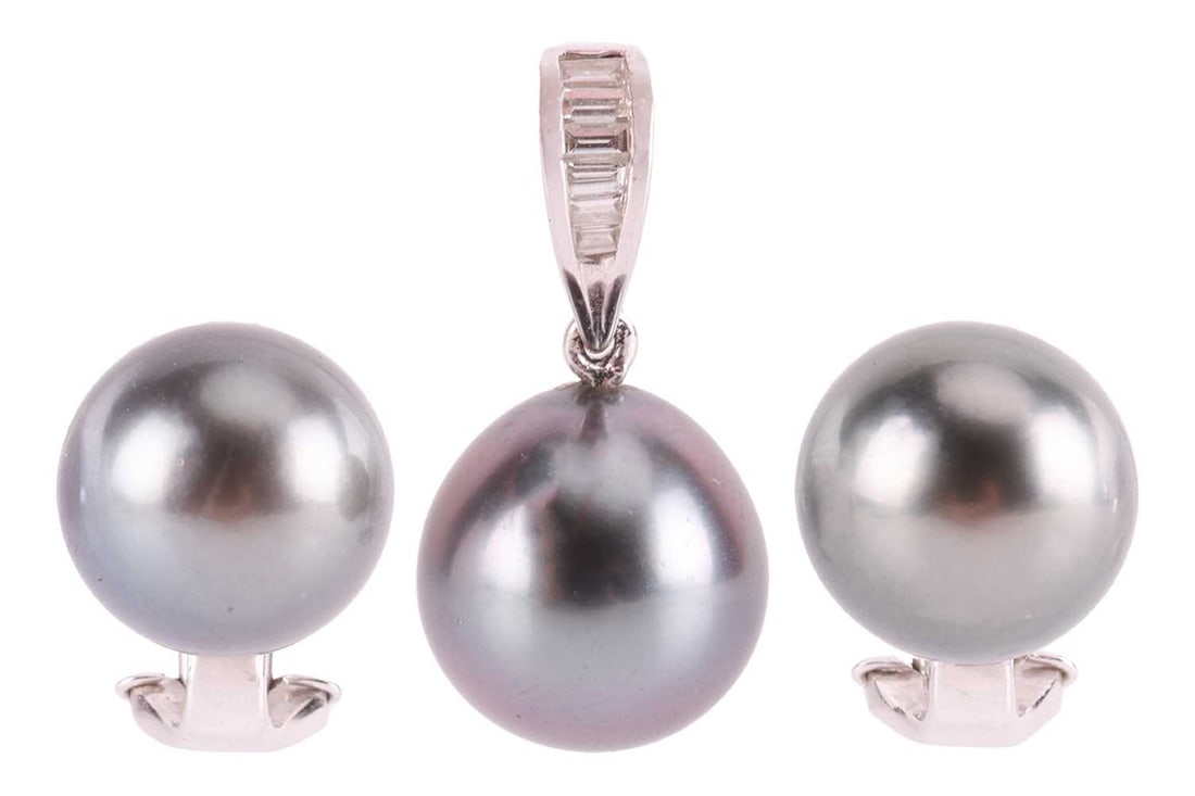A Tahitian cultured pearl pendant and earrings ensuite, the pendant comprising a drop of 10.5 mm, su: A Tahitian cultured pearl pendant and earrings ensuite, the pendant comprising a drop of 10.5 mm, suspending on a bail in 18ct white gold, channel-set with a row of calibré-cut diamonds, British 