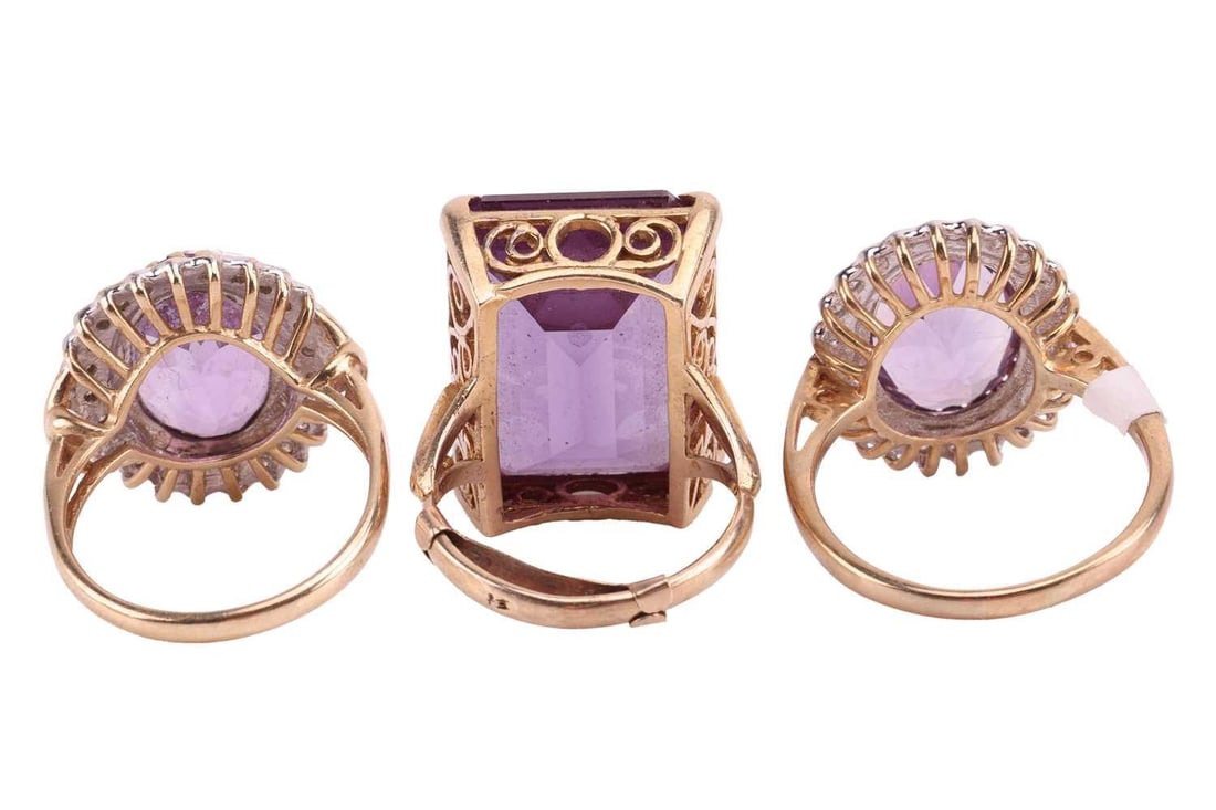 Three gem-set rings and one amethyst pendant; One rectangular-cut synthetic colour-change sapphire: Three gem-set rings and one amethyst pendant; One rectangular-cut synthetic colour-change sapphire ring set in 9ct gold, stone size approximately 22 x 15.9 x 9.2mm, UK hallmarks, dated 1973, makers ma