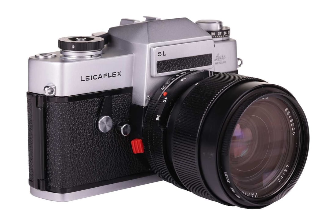 A Leica Leicaflex SL SLR Camera Outfit, late 1960s German, chrome, serial no. 1223828, with original: A Leica Leicaflex SL SLR Camera Outfit, late 1960s German, chrome, serial no. 1223828, with original instruction booklet, fitted with a Leitz Vario Elmar R 1:3,5/35 70mm E60 lens, serial number 334820