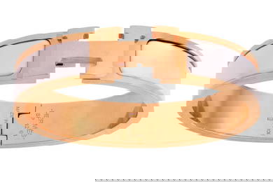 Hermes - a Clic H bracelet, of oval form with hinge opening and "H" toggle clasp, in pink base metal