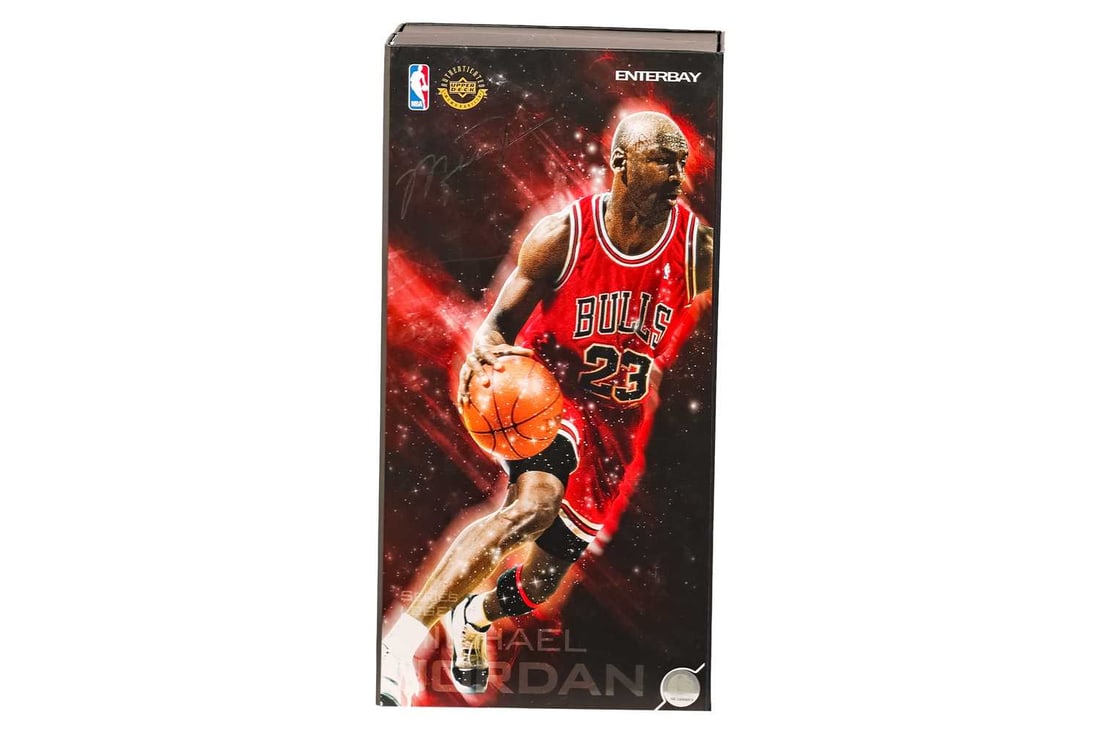 An Enterbay Michael Jordan 1:6 scale collectible figure, in original box, appears complete but likel: An Enterbay Michael Jordan 1:6 scale collectible figure, in original box, appears complete but likely previously displayed. Some wear and damage to the outer box