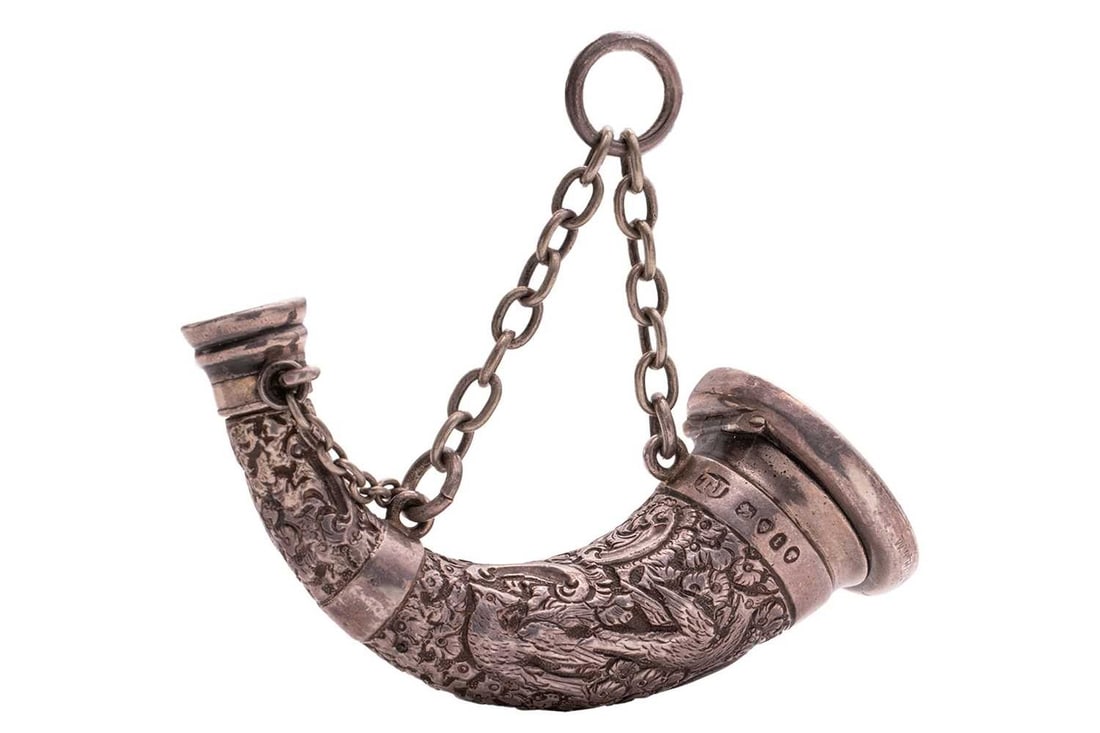 A Victorian silver combination vinaigrette and scent bottle, in form of a powder horn, by Thomas: A Victorian silver combination vinaigrette and scent bottle, in form of a powder horn, by Thomas Johnson I, London 1874, the wider end terminated with a flat hinged cover, open to reveal gilt interior