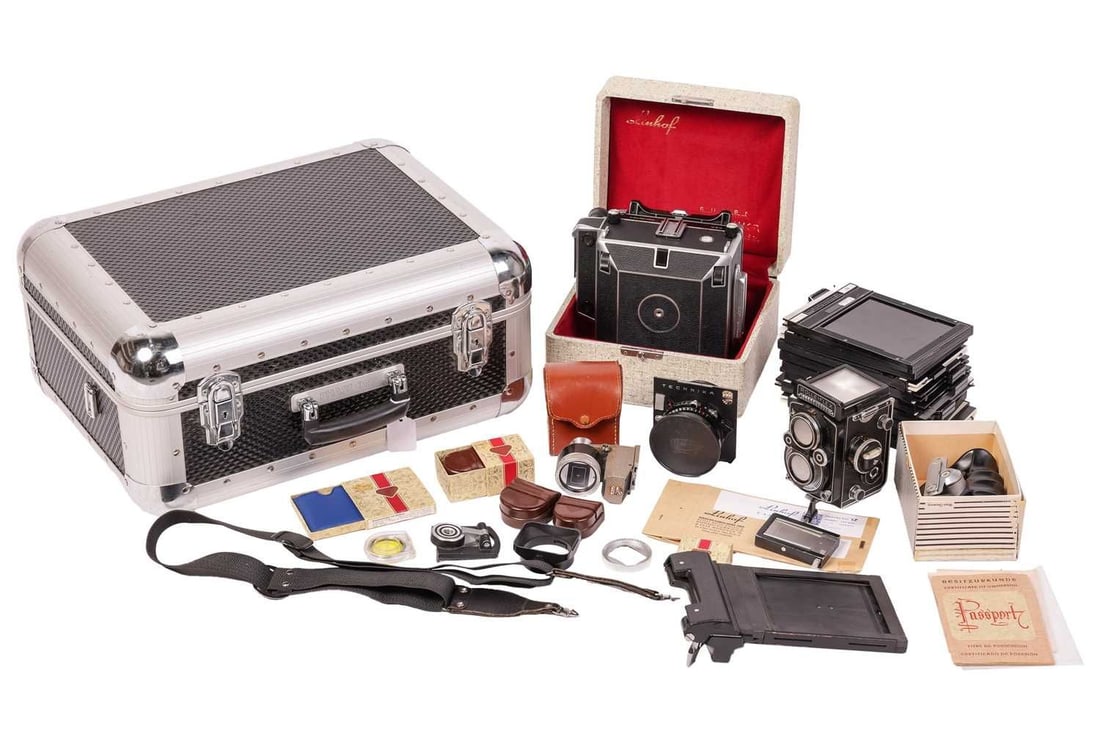 A Linhof Super Technika 70 Camera, boxed with paperwork, together with a large quantity of related: A Linhof Super Technika 70 Camera, boxed with paperwork, together with a large quantity of related items, to include a 1950's Rolleiflex 3.5f camera, serial number 2290932. The phase one hardcase cont