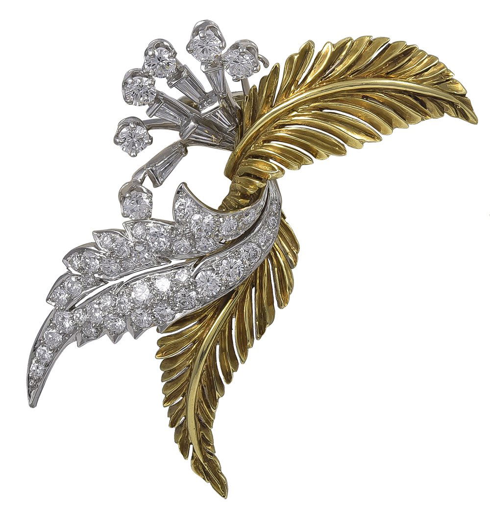 McTeigue Diamond Spray Pin: An attractive pin designed as three scrolling acanthus leaves, set with round and baguette-cut diamonds, weighing approximately 3.00 carats total, mounted in platinum and 18K yellow gold, hallmarked f