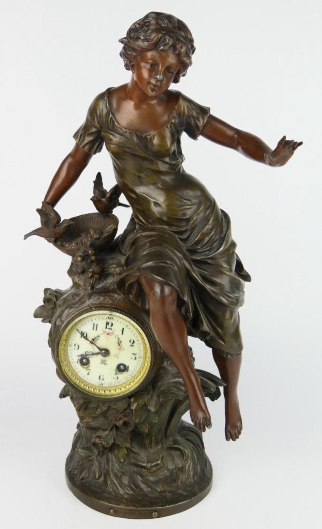 Moreau bronze clock with seated lady titled premier fruit. Measures appprox 20 " tall x 9 "wide.: Moreau bronze clock with seated lady titled premier fruit. Measures appprox 20 " tall x 9 "wide.