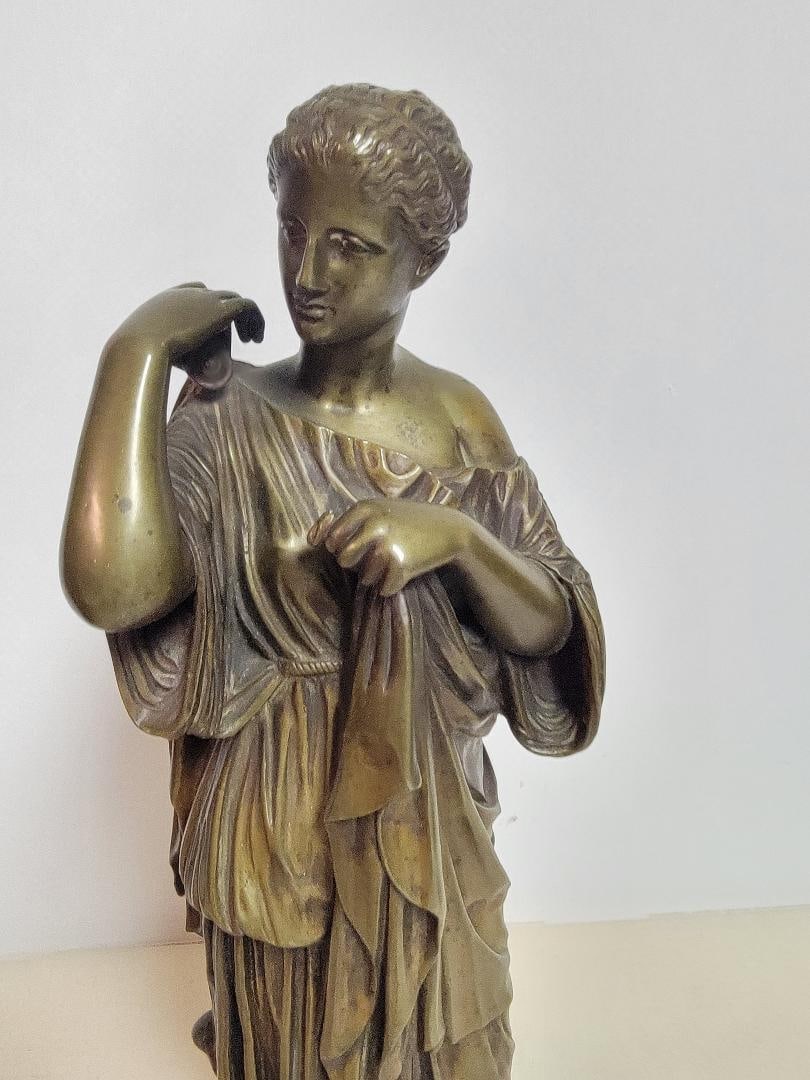 The Diana of Gabii is a statue of a woman draped probably representing the goddess Artemis, which: The Diana of Gabii is a statue of a woman draped probably representing the goddess Artemis, which was attached to the sculpture Praxiteles. The statue was discovered in 1792 by Gavin Hamilton on the p