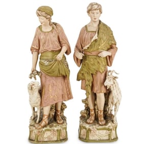 pair of antique Royal Dux porcelain figures. Features two shepherds, a male and female figure