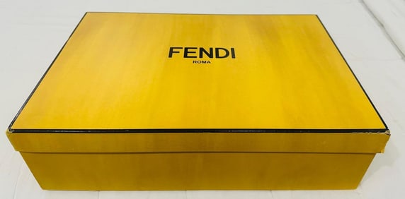 “Stylish FENDI navy blue Boots,with Red detailing,durable lug soles,and a modern high-great
