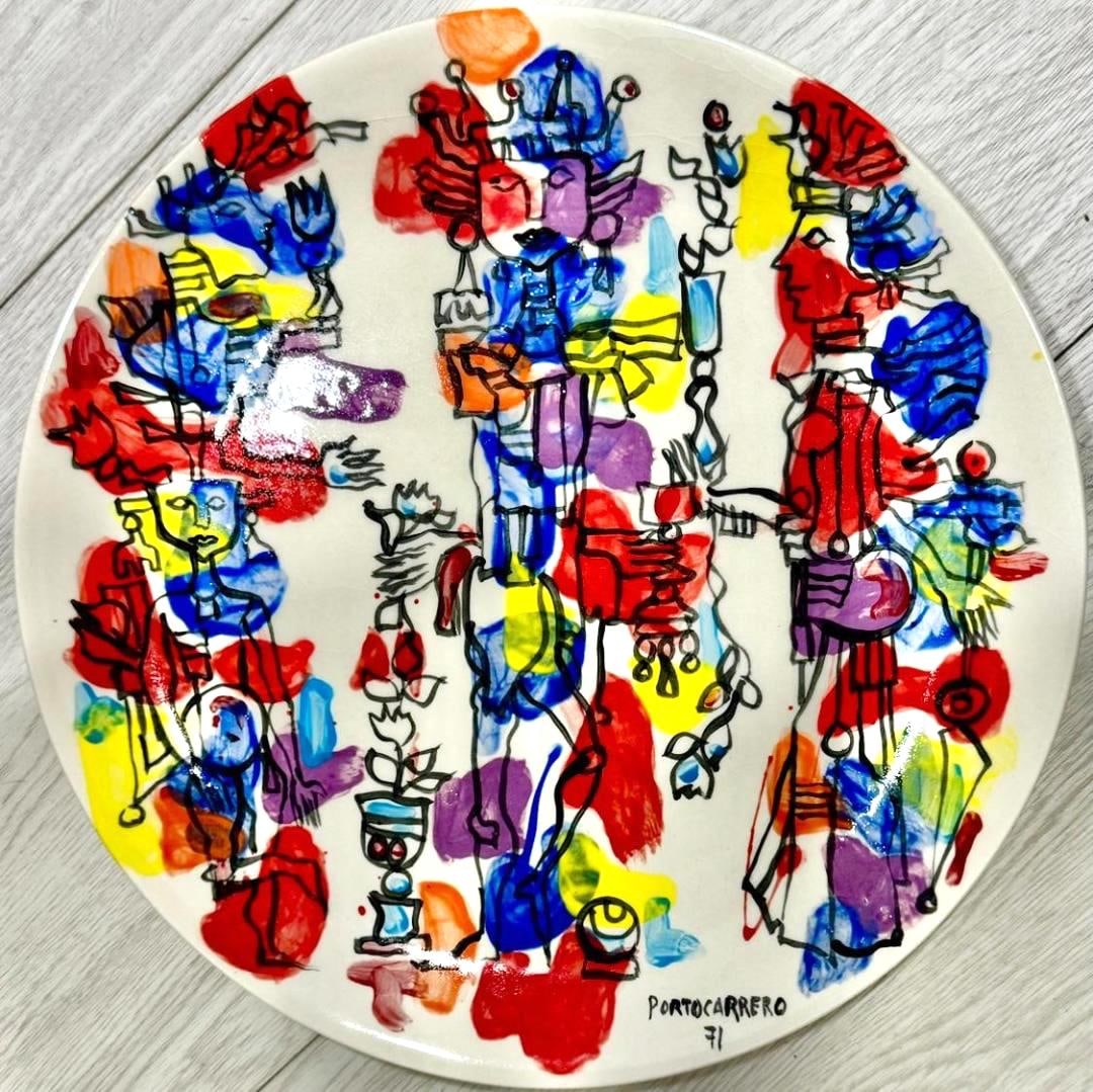 Rene Portocarrero,was one of the pioneers in Cuban art, and an artist combining strong lines with: Rene Portocarrero,was one of the pioneers in Cuban art, and an artist combining strong lines with rich bright colours concentrating mainly on Spanish colonial subjects and interiors. A recurring featu